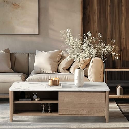 Modern living room with beige sofa, wooden coffee table, and decorative vase.