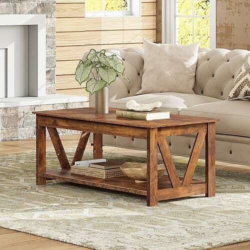 Rustic wood coffee table with decor in a cozy living room.